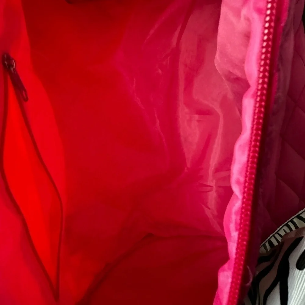 Pink dance bag with zebra print accent.